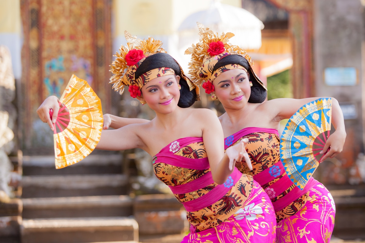 Two girls performance traditional dance in Ubud Bali