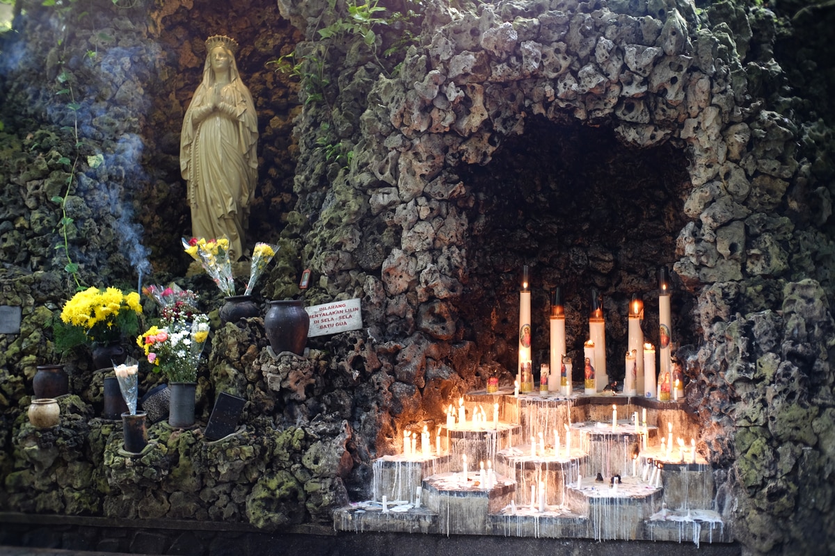 beautiful candles lit in Maria Cave Sendangsono
