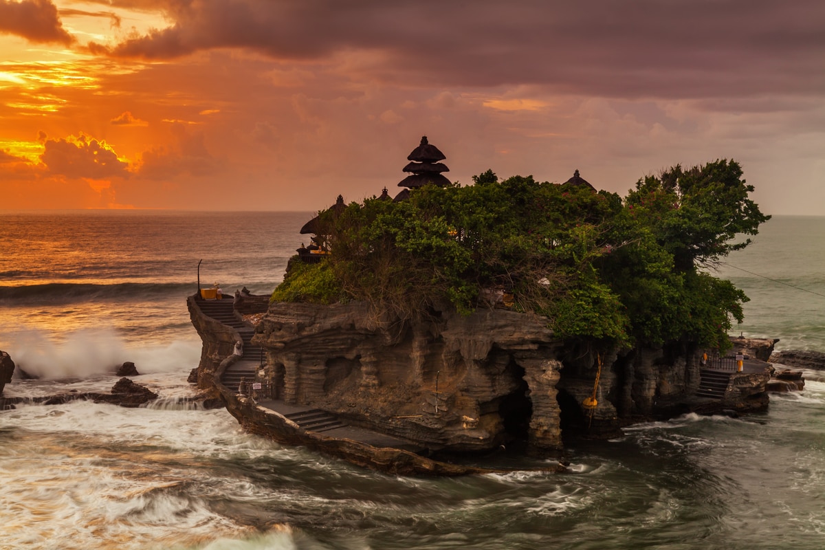 Tanah Lot Temple in Tabanan Bali with waves below